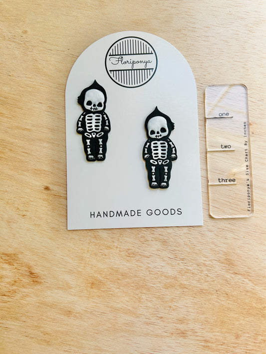 Skeleton kewpie earrings